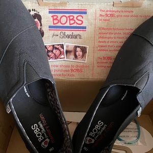 Bobs by Skechers…black slip on shoes. Never worn